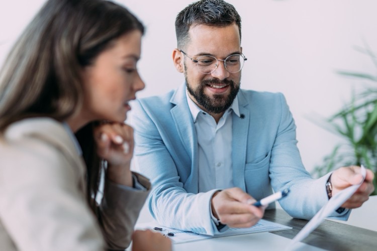 School leaders reviewing safeguarding and attendance priorities together.
